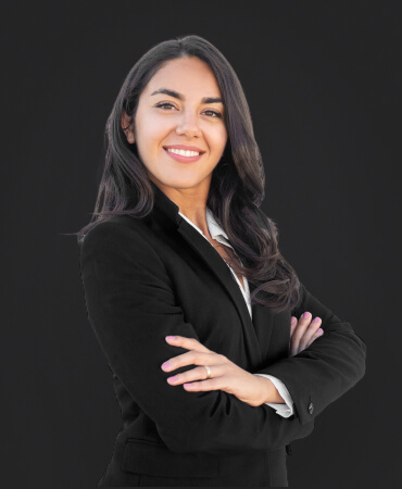 young woman with dark hair in black suit