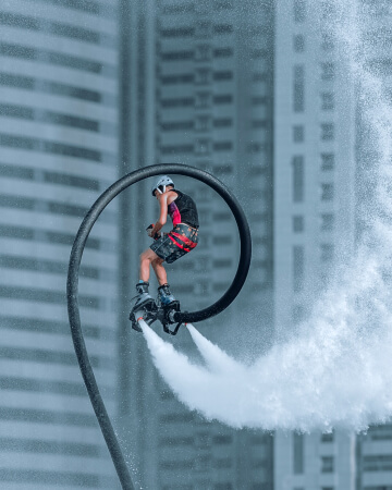 man in the air on flyboard